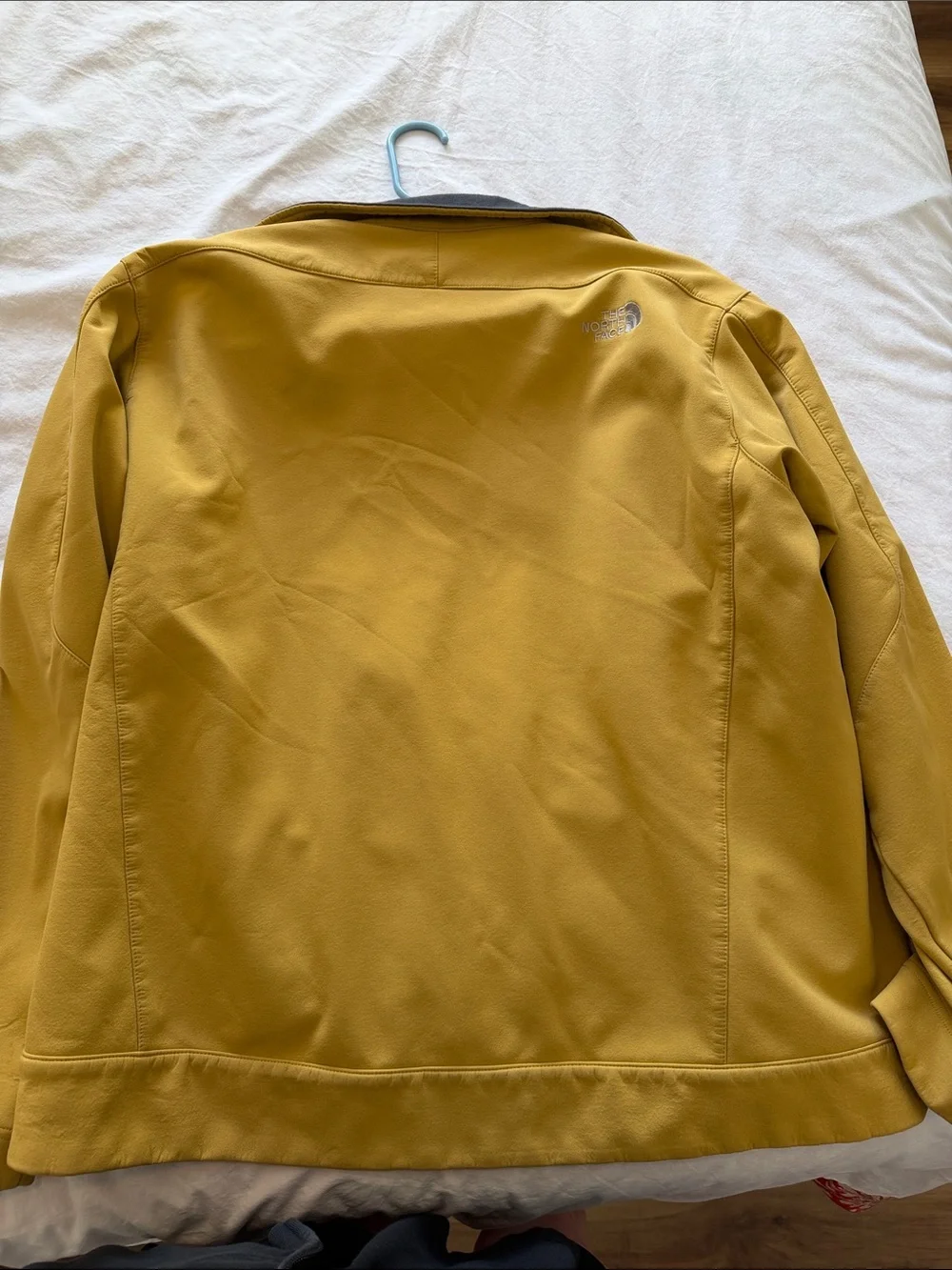 The North Face Yellow Softshell Jacket with Gray Lining